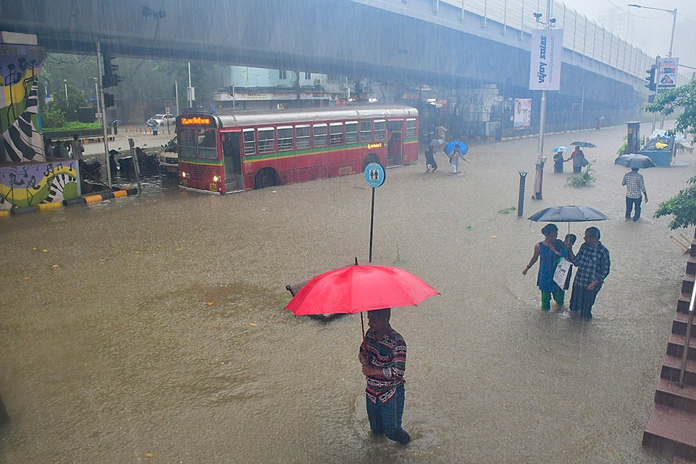 | Photo: PTI : Waterlogging at Parel in Mumbai